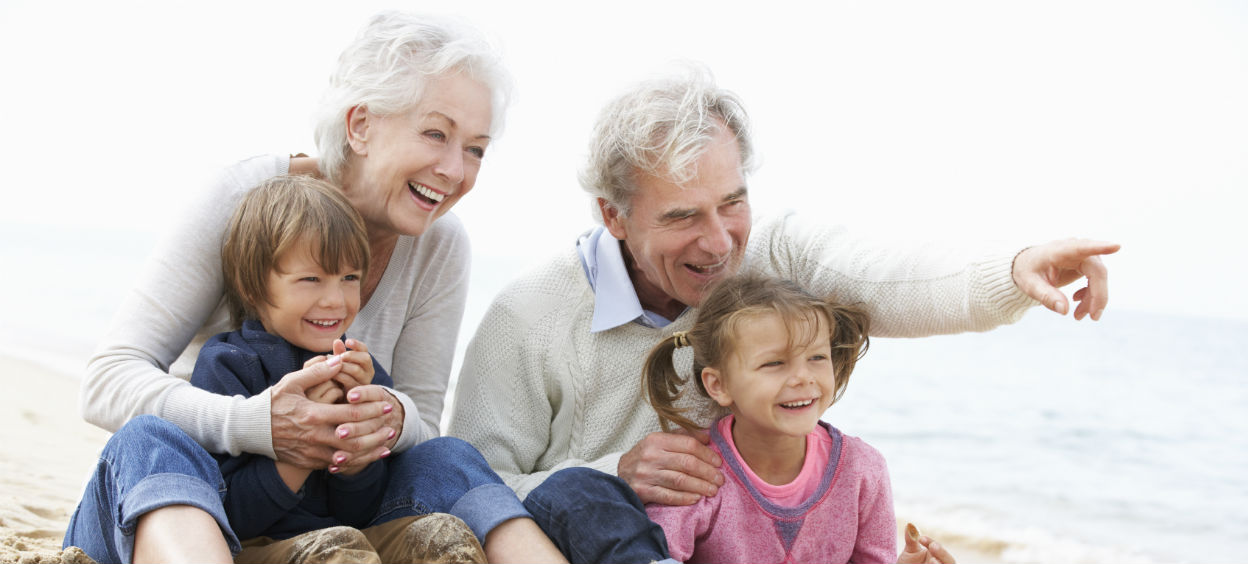 Grandparents and grandchildren on the beach